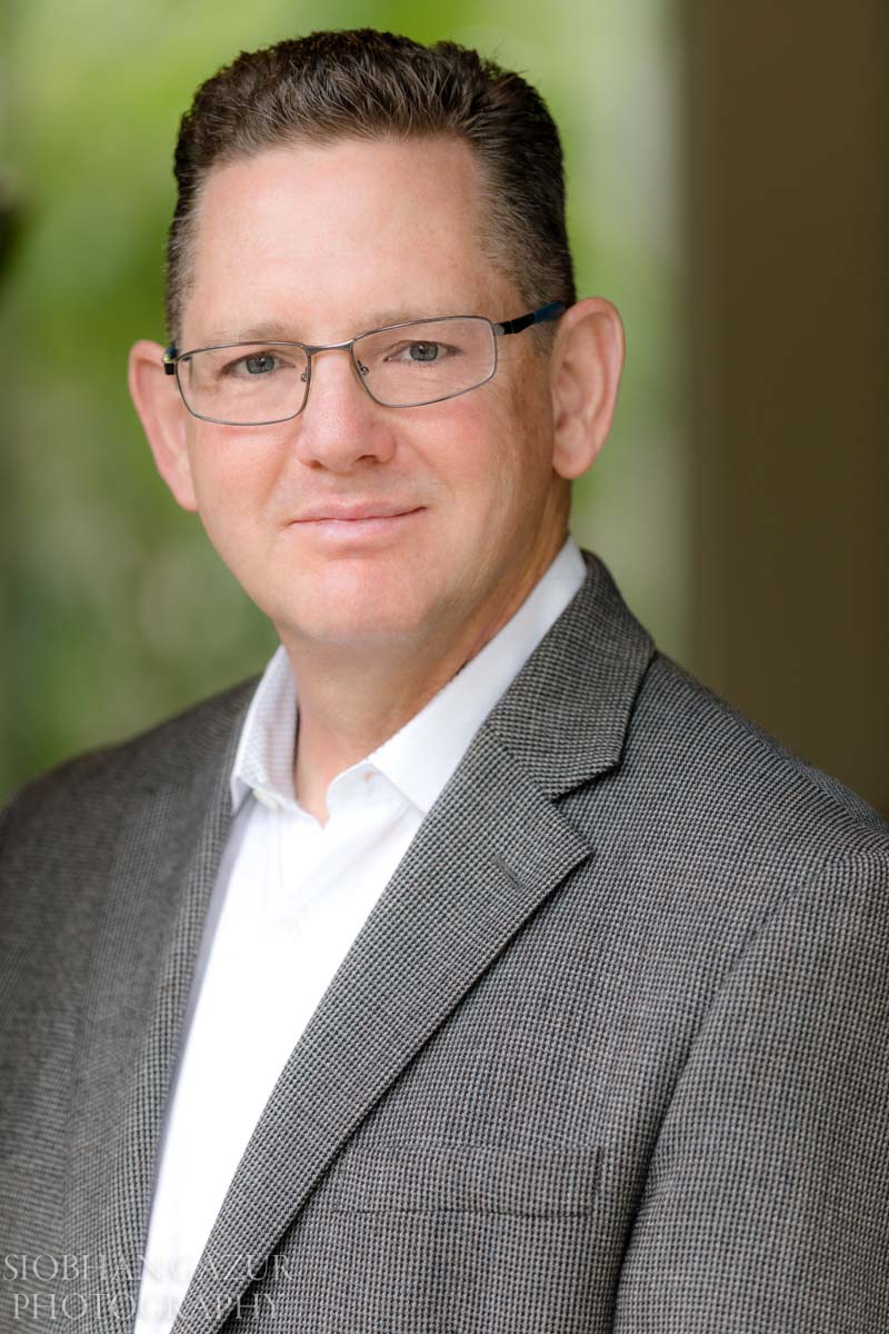 Business man with glasses on location san diego professional headshots by Siobhan Gazur Photography