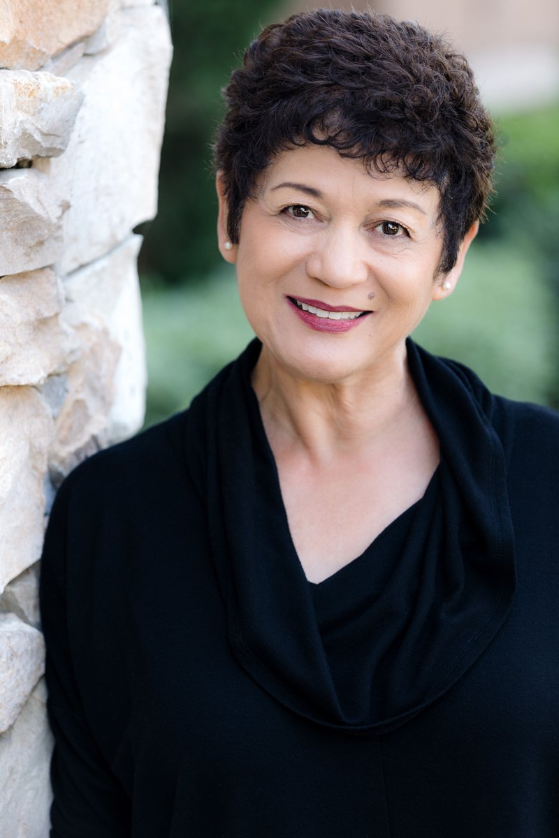 Business woman in black on-location san diego executive headshots by Siobhan Gazur Photography