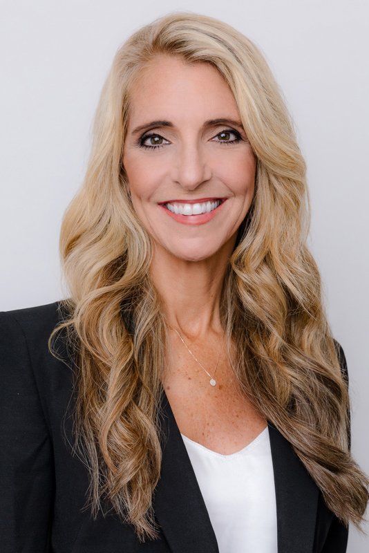 Business woman with long blonde hair in black blazer san diego studio headshots by Siobhan Gazur Photography