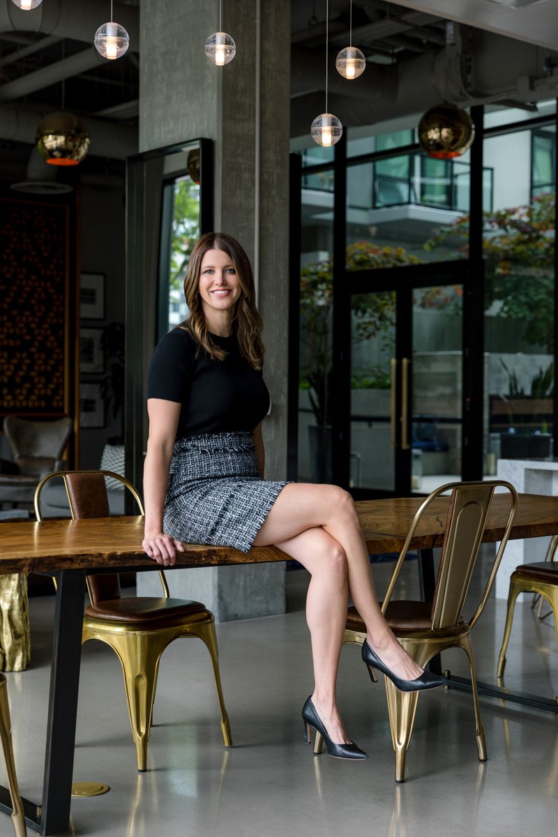 Seated personal branding portrait of a business woman in modern interior san diego branding photography by Siobhan Gazur Photography